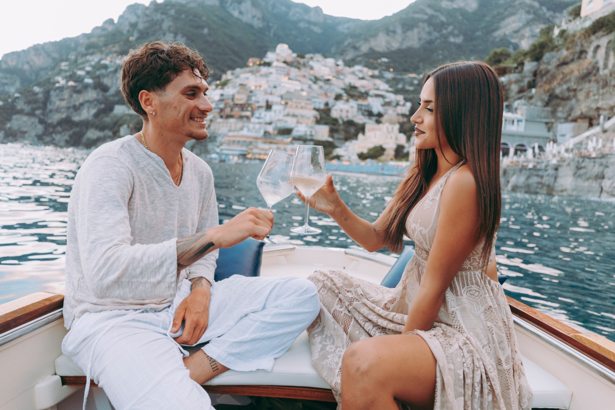 Couple enjoying a private boat experience in Positano