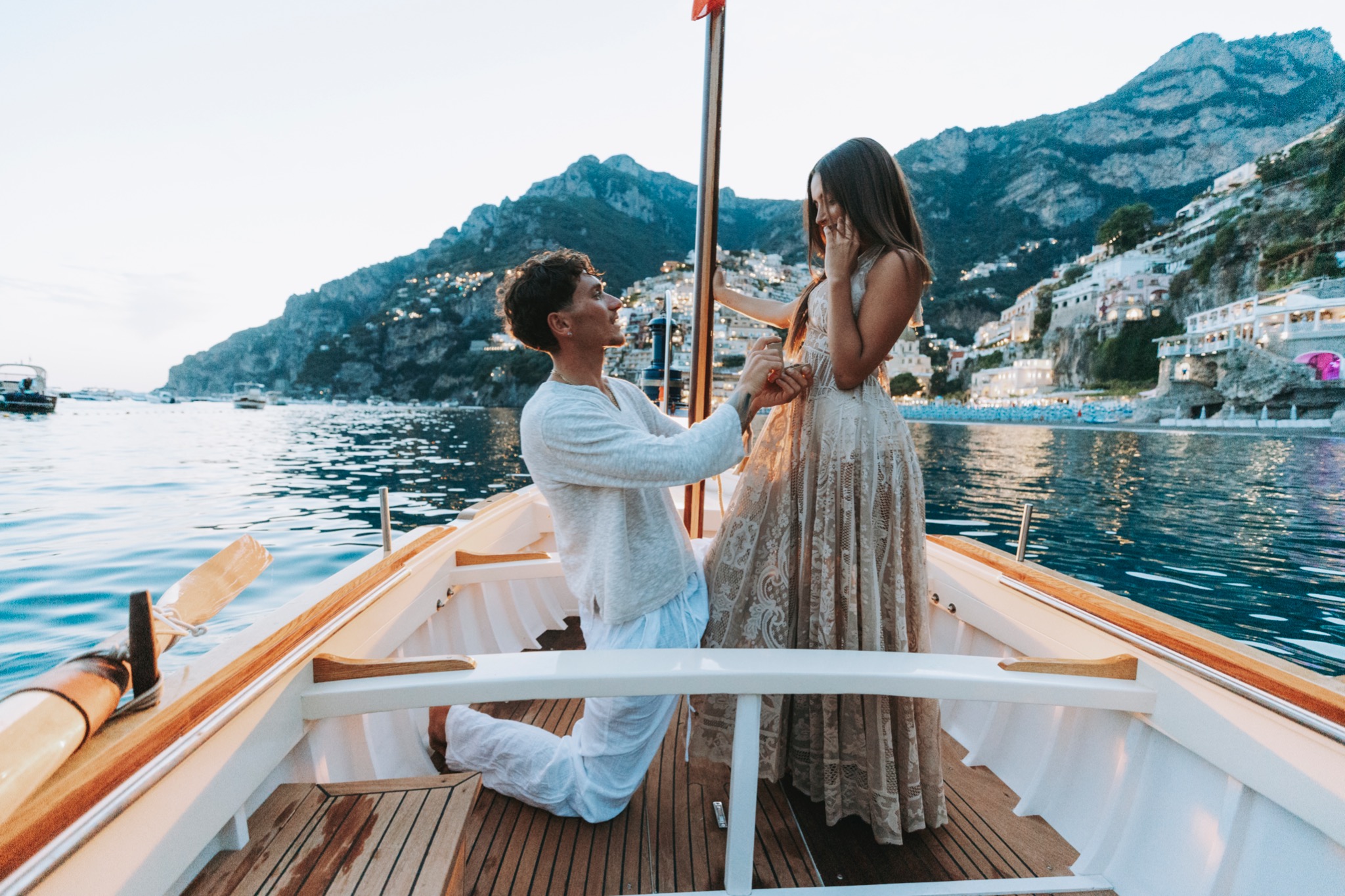 Traditional boat beneath Positano at night